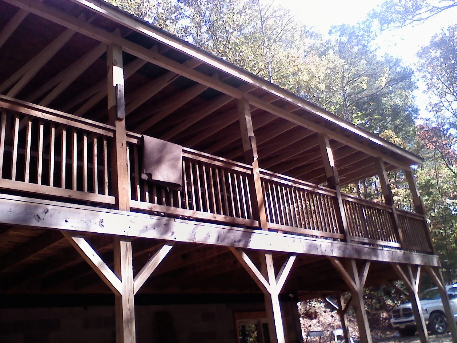 Timber framing under a new elevated porch and deck — Roof Leak Repair in Cana by Roofing Brothers